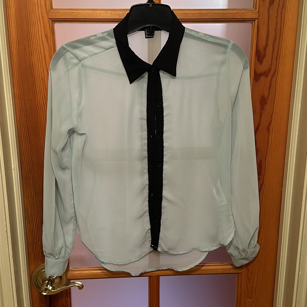 Mint green blouse with black edging